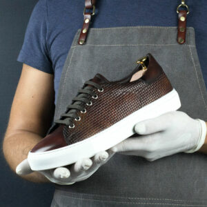 Front view of model Fire Museum Braided Calf Trainer, sponge painting techniques with shades of brown, red and yellow Golf BespokeShoes